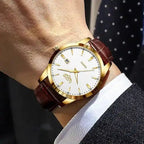 Skórzany zegarek męski z brązowym paskiem - calixus